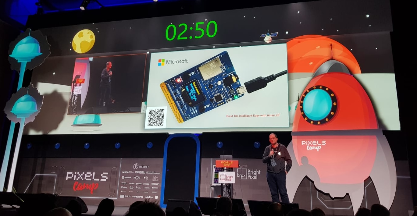 Me on stage, with a picture of the MxChip front and center Me on stage, with a picture of the MxChip front and center