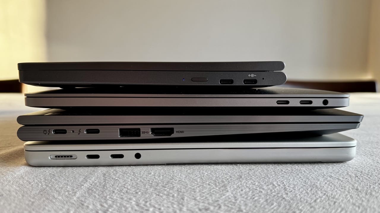 The X, a MacBook 13", a Lenovo X1 Yoga and a modern MacBook Pro